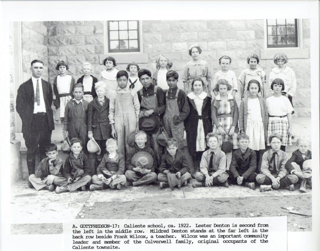 A black and white photo shows a teacher and 28 students from Caliente School, circa 1922.