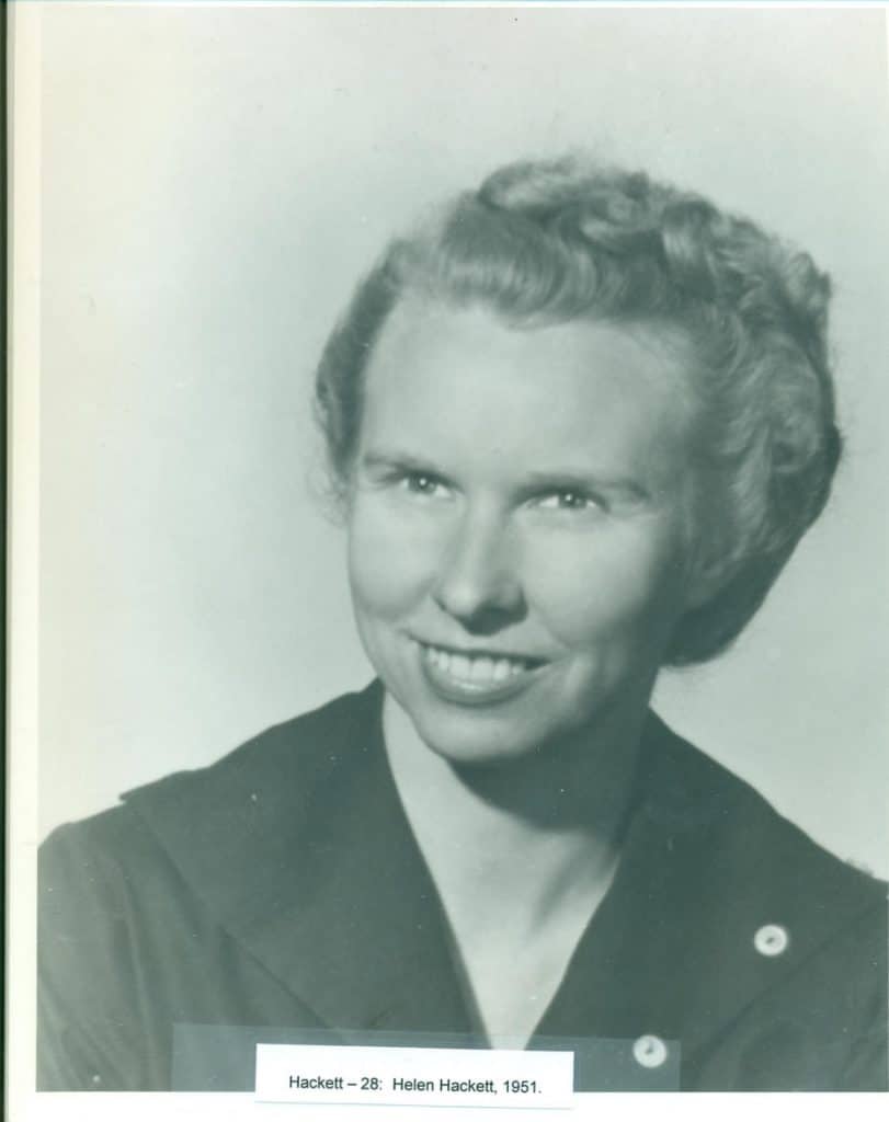 A black and white portrait of a smiling woman with wavy hair, wearing a dark jacket. "Hackett - 28: Helen Hackett, 1951."