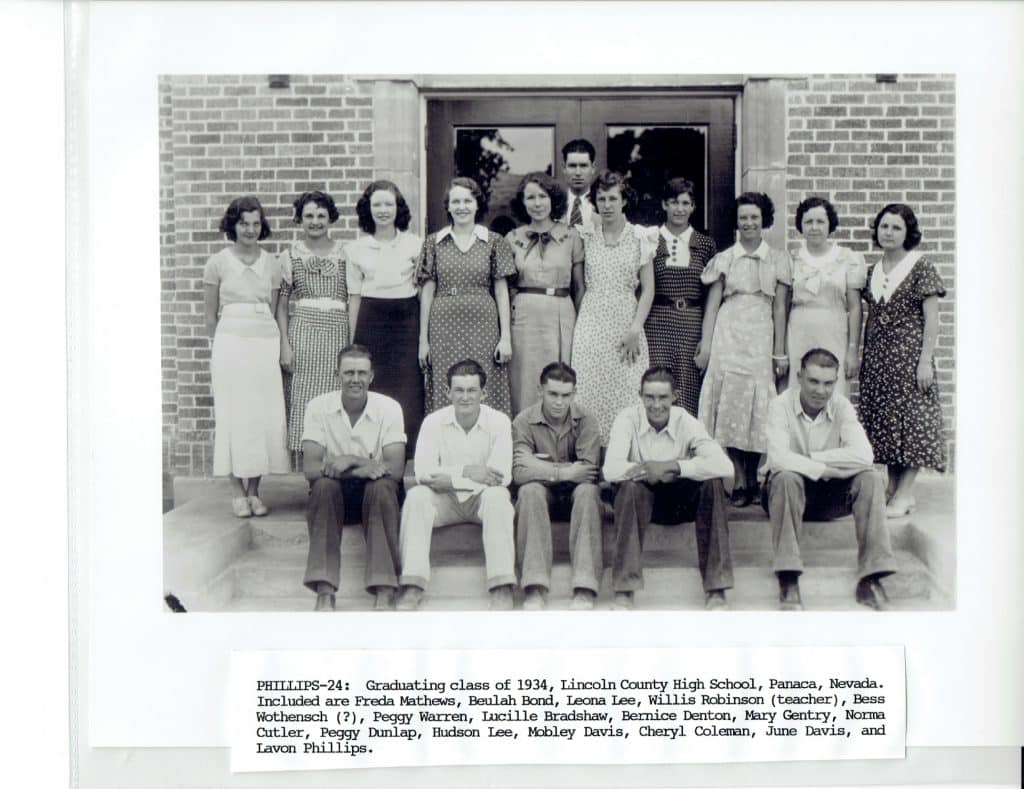 A black and white photo shows 15 young adults, 11 women and 4 men, posing on brick steps.